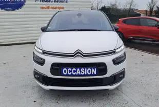 Citroën C4 Spacetourer blanc vue 3/4 avant droit, avec jantes alliage bicolores et calandre noire distinctive.