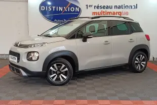Vue latérale gauche d'un Citroën C3 Aircross beige 2021 avec toit noir et jantes alliage bicolores.