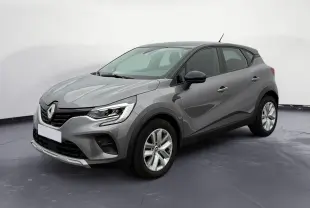 Renault Captur TCE 140 2022 gris Cassiopée avec toit noir, vue 3/4 avant droit, jantes alliage et calandre marquée.