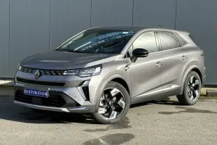 Renault Symbioz gris Cassiopée en 3/4 avant droit, avec jantes 18 pouces et rétroviseurs noirs brillants.