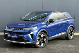 Renault Symbioz E-Tech hybride bleu Iron en 3/4 avant droit avec jantes 18 pouces et calandre distinctive.