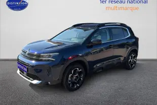 Citroën C5 Aircross bleu eclipse vue 3/4 avant droit avec jantes alu et barres de toit noires.