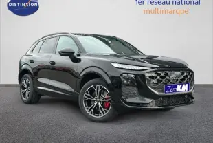 Audi Q3 2.0 TDI S line noir métallisé en 3/4 avant droit avec jantes alu et étriers rouges visibles.