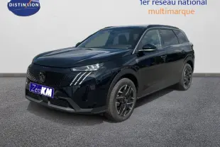 Peugeot 5008 noir 3/4 avant droit, SUV hybride 2025 avec jantes aluminium et feux LED distinctifs.