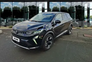 Renault Symbioz noir en 3/4 avant droit, avec phares LED et jantes au design moderne, stationné devant un bâtiment vitré.