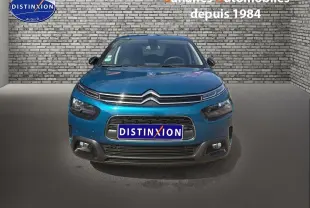 Vue avant d'une Citroën C4 Cactus 2020 bleu métal avec calandre distinctive et phares séparés.