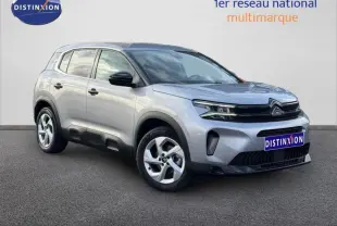 Citroën C5 Aircross gris 3/4 avant droit, SUV compact avec calandre noire et jantes alliage distinctives.