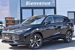 MG Motor EHS 1.5 Hybrid+ 224 ch Luxury noir en 3/4 avant droit, jantes alliage 19 pouces et calandre distinctive.