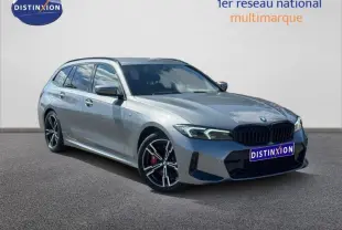 BMW Série 3 320dA xDrive M Sport grise métallisée vue 3/4 avant avec jantes sport et calandre noire.