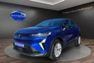 Renault Captur TCe 90 Evolution bleuiron en 3/4 avant droit avec toit noir et jantes 17 pouces en showroom.