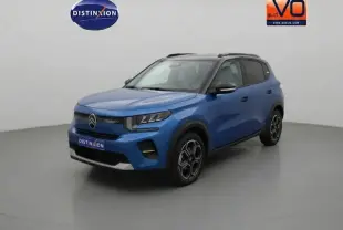 Citroën C3 Turbo 100 ch bleu foncé en 3/4 avant droit avec barres de toit et jantes alliage 17 pouces.