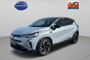 Renault Symbioz gris clair en 3/4 avant droit, avec jantes alliage noires et toit noir contrasté.