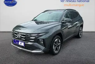 Hyundai Tucson 1.6 t-gdi 215 hybride vert cyprès en 3/4 avant avec jantes alliage et calandre distinctive