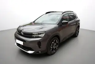 Citroën C5 Aircross gris platinium métal en 3/4 avant droit avec jantes noires et toit noir contrasté.