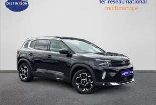 Citroën C5 Aircross noir Perla Nera vue 3/4 avant droit, avec jantes alu et barres de toit visibles.