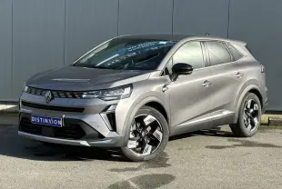 Renault SYMBIOZ gris Cassiopée en 3/4 avant droit, avec jantes 18 pouces et rétroviseurs noirs brillants.