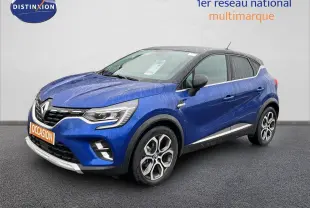 Renault Captur hybride rechargeable bleu Iron Metal avec toit noir, vue 3/4 avant droit, jantes alliage distinctives.