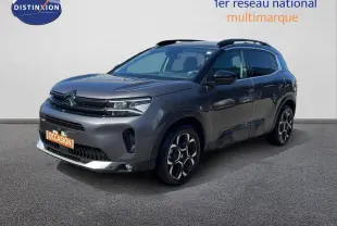 Citroën C5 Aircross gris platinium métal en 3/4 avant droit, avec jantes bi-ton et toit noir.