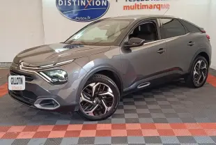 Citroën C4 BlueHDi 130 gris foncé vue 3/4 avant droit, avec jantes alliage et phares LED ellipsoïdaux.