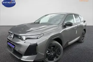 Vue 3/4 avant d'un Citroën C5 Aircross gris platinium avec jantes noires et calandre moderne.
