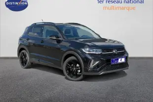 Volkswagen T-Cross noir en 3/4 avant droit, avec jantes noires et détails R-Line visibles.