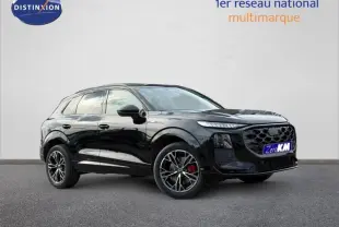 Audi Q3 2.0 TDI S line noir métallisé, vue 3/4 avant droit avec jantes alliage et étriers rouges.
