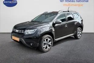 Dacia Duster Journey TCe 150 noir en 3/4 avant droit, avec jantes bi-ton et calandre distinctive LED.