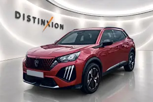 Peugeot 2008 rouge elixir vue 3/4 avant droit avec calandre noire et feux LED distinctifs.