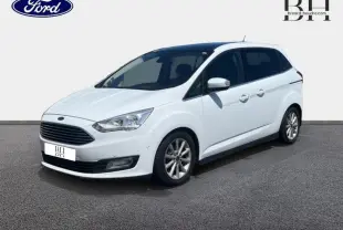 Ford Grand C-Max blanc glacier en vue 3/4 avant droit, avec vitres arrière surteintées et jantes alu.