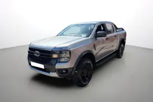 Ford Ranger gris iconic en 3/4 avant droit avec arceaux noirs et marchepieds visibles, double cabine et benne couverte.