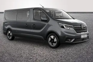 Renault Trafic Fourgon gris foncé en vue 3/4 avant droit, avec phares LED et jantes distinctives.