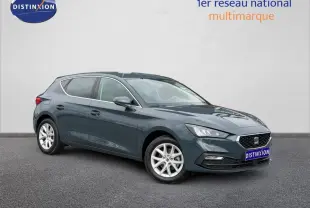 SEAT Leon 2.0 TDI 2025 gris magnétique métallisé vue 3/4 avant droit avec jantes alu et phares LED.