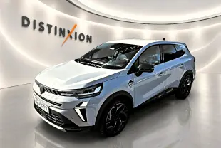 Renault Symbioz gris cassiope en 3/4 avant droit, avec jantes noires et détails noirs contrastants.