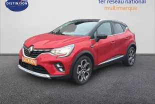 Renault Captur 1.3 TCE 155 EDC Edition One rouge flamme en 3/4 avant droit avec toit noir et jantes bi-ton.