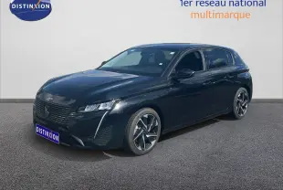 Peugeot 308 noir métal vue 3/4 avant droit, avec calandre distinctive et jantes alliage bicolores.