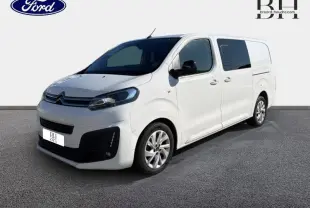Vue 3/4 avant droit d'un Citroën Jumpy XL blanc Banquise avec vitres arrière teintées et jantes alu.