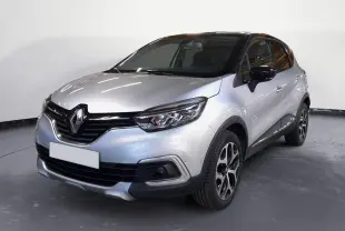 Renault Captur TCe 120 Energy Iridium 2017 gris clair métal avec toit noir, vue 3/4 avant droit, jantes alliage distinctives.