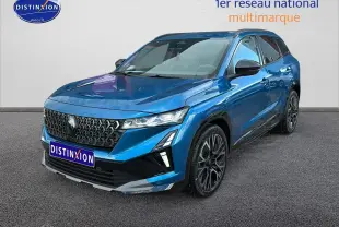 Renault Austral 2026 bleu en 3/4 avant droit avec calandre noire et jantes alliage 20 pouces.