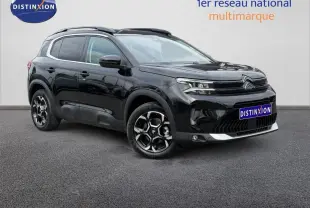 Citroën C5 Aircross noir Perla Nera vue 3/4 avant droit avec jantes alu et barres de toit visibles.