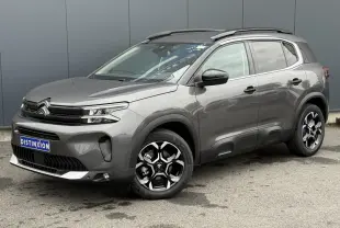 Citroën C5 Aircross gris Platinium en 3/4 avant droit, avec jantes alliage bi-ton et toit noir Perla Nera.