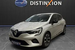 Renault Clio V gris aluminium vue 3/4 avant droit, avec jantes alliage bicolores et calandre noire brillante.
