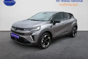 Renault Captur 2026 gris Cassiope toit noir en 3/4 avant droit, jantes alu et feux LED distinctifs.